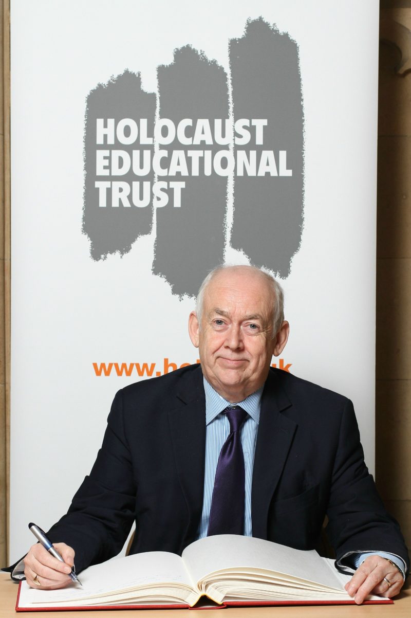 Wayne David signing the Holocaust Educational Trust