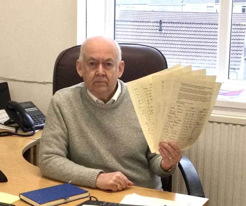 Wayne David with copies of the petition signed by residents in Bargoed