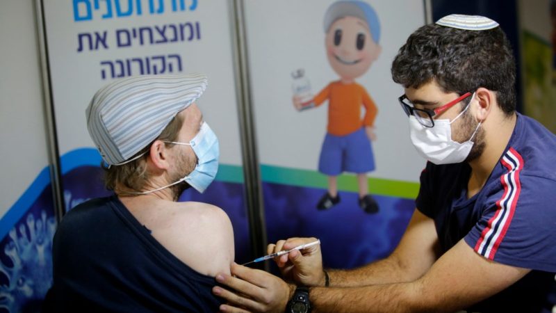An Israeli citizen being vaccinated
